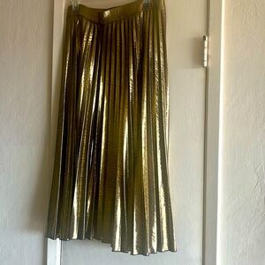This gold pleated skirt is perfect for the holidays